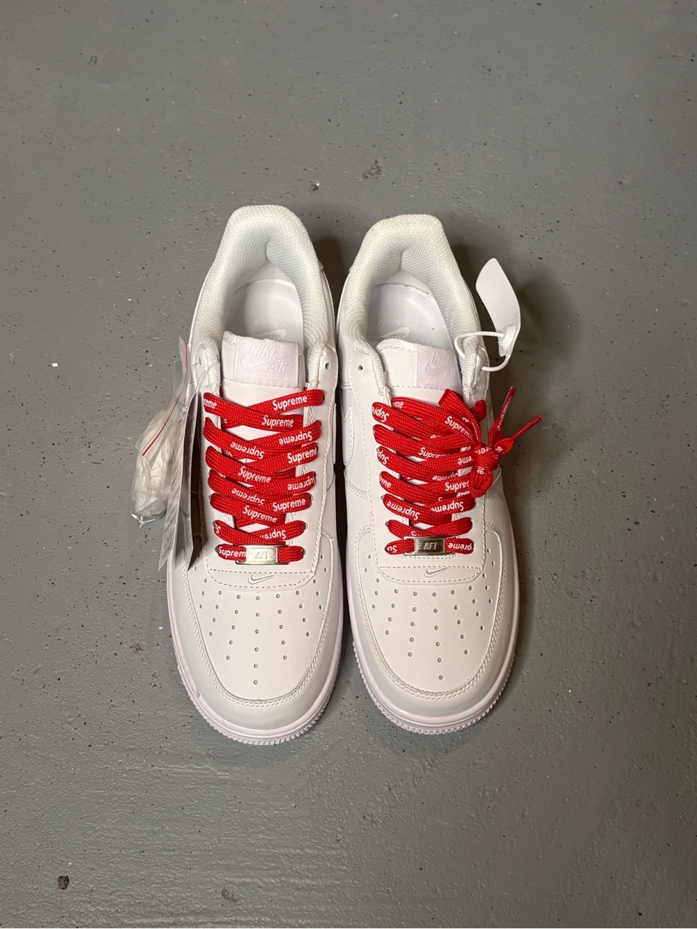 Supreme White Leather Low-Top Sneakers with Red Logo Laces